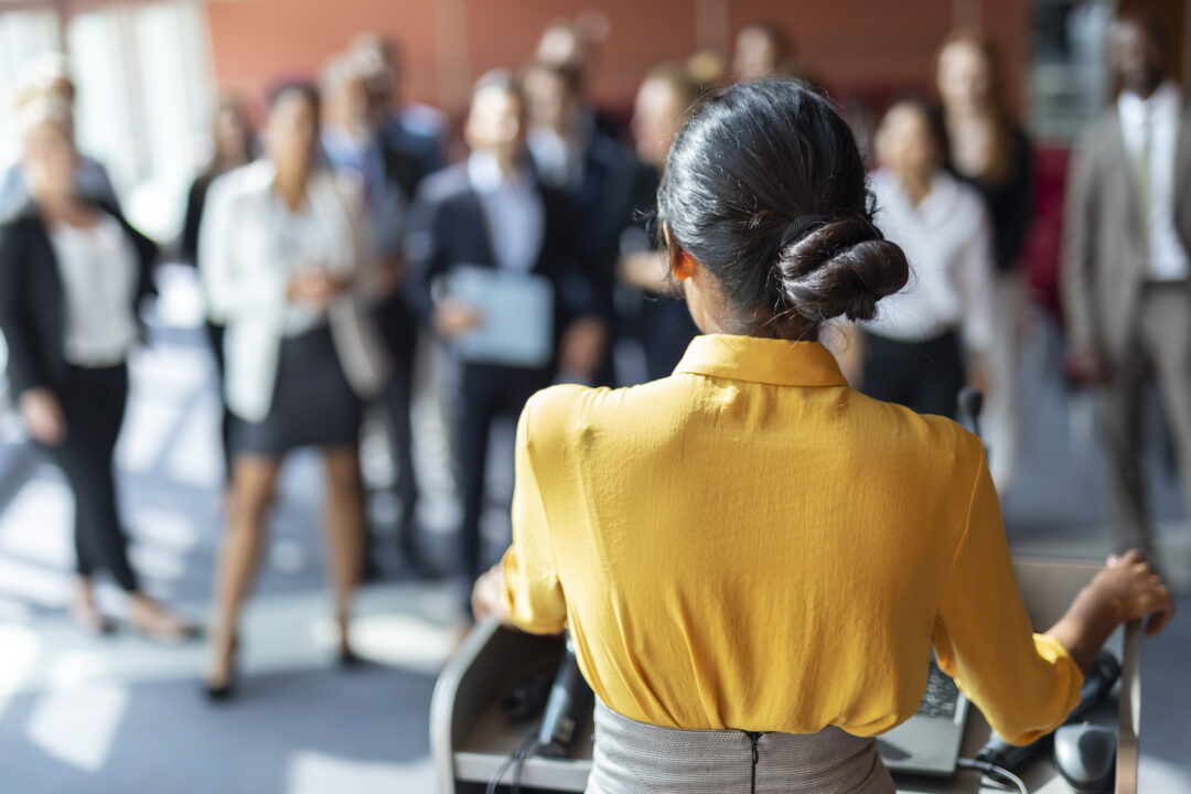 Woman speaking at conference