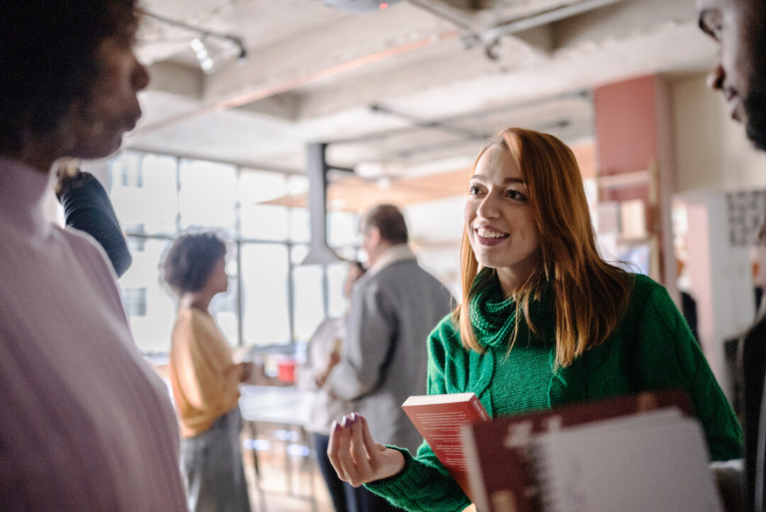 Woman communicating at a networking event